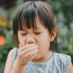 Girl coughing Winter